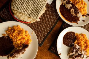 Turkey mole and rice, with hot corn tortillas.