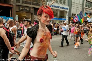 A red-haired, horned participant in the 2011 Pride Parade on New York's Fifth Avenue.