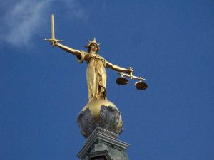 Stock photo of blindfolded Justice holding scales