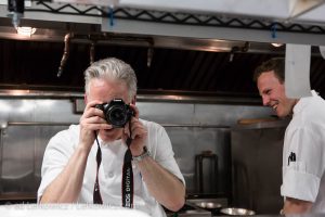 Chip Smith, chef at The Simone, taking my picture as I'm taking his for the NY Times.