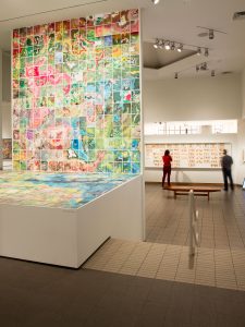 The galleries of The American Folk Art Museum, with Jerry Gretzinger's "Jerry's Map," in mulitple panels and cards.