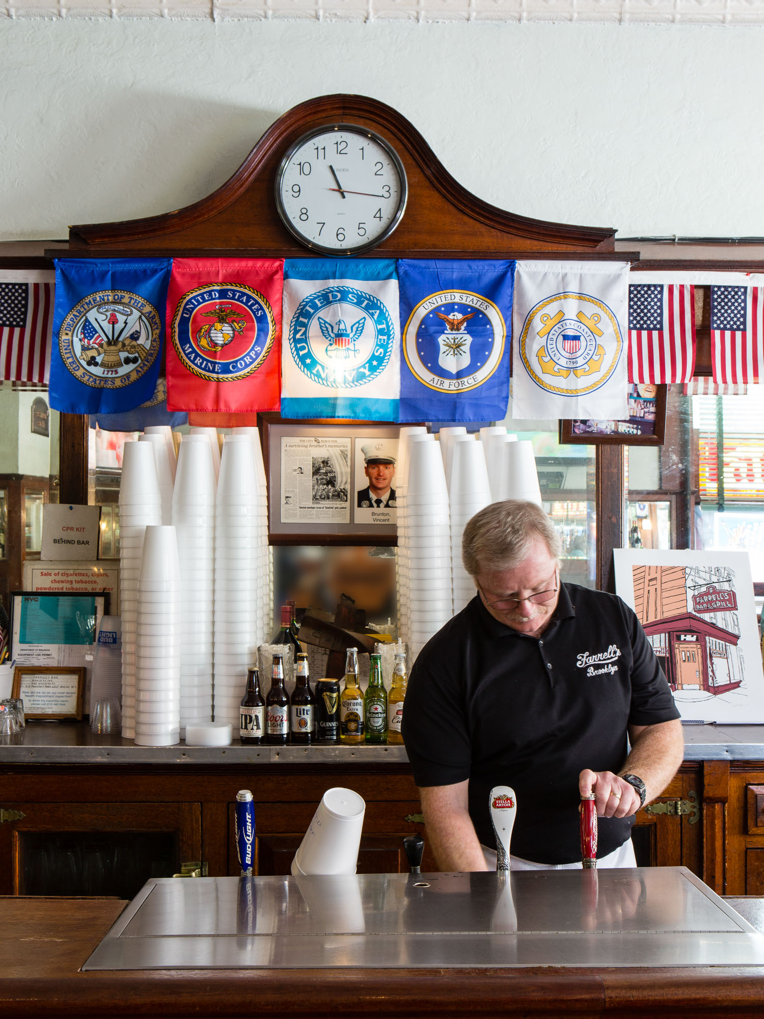 Bartender pouring a draft beer at Farrell's Bar and Grill in Windsor Terrace.