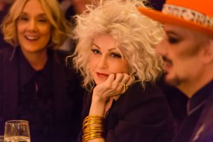 Cyndi Lauper, with Boy George in the foreground, for the New York Pops