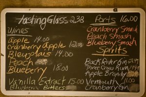 Blackboard tasting sign in a winery's tasting room