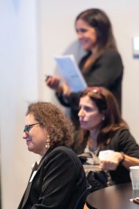 Three women at a business conference